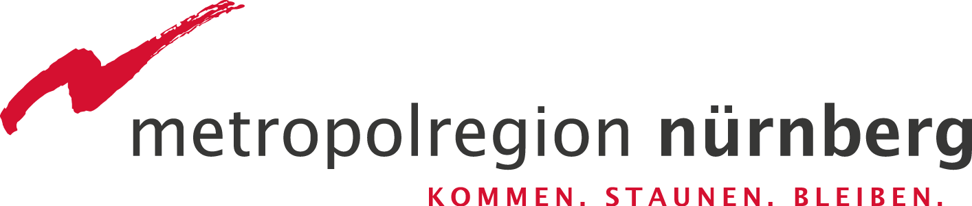 MetropolregionNuernberg_Logo_Slogan_4c Logo der Metropolregion Nürnberg mit Slogan in den Farben Anthrazit und rot.